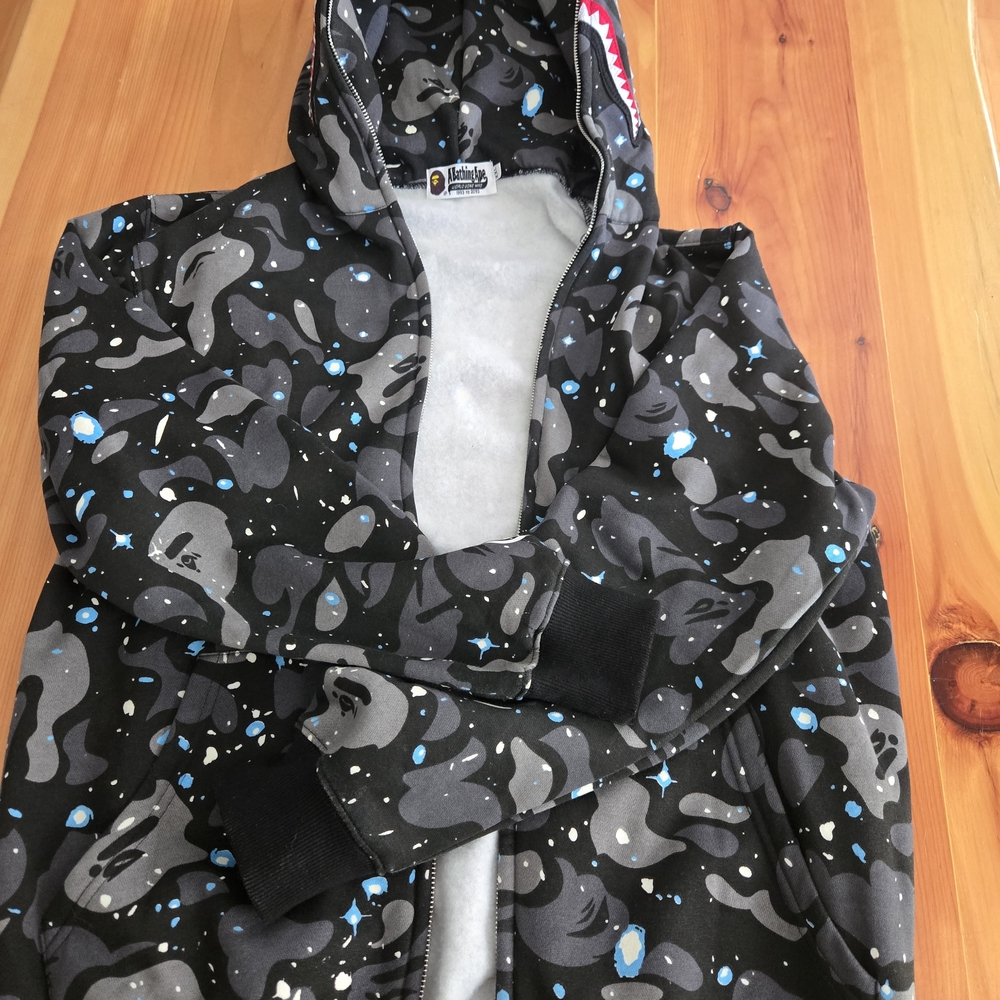 A Bathing Ape Camouflage Hoodie with Blue and Red Accents